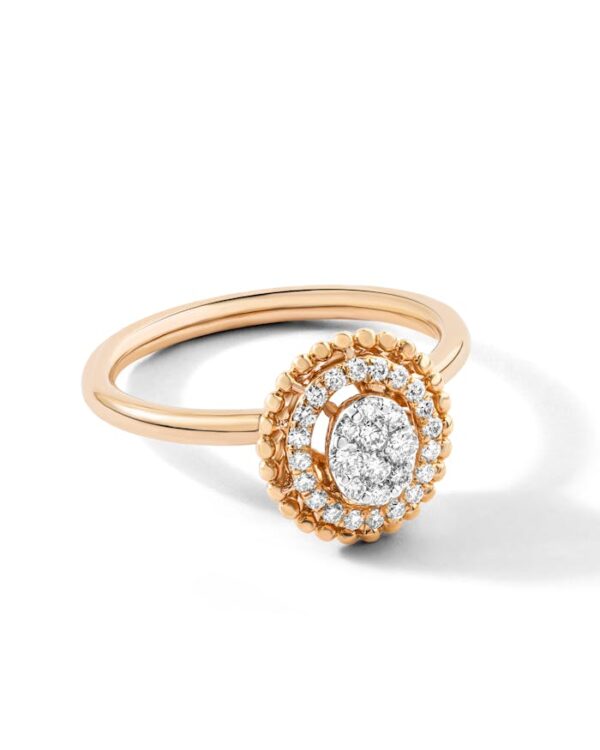 Close-Up Shot of Gold and Silver Diamond Ring on white Surface